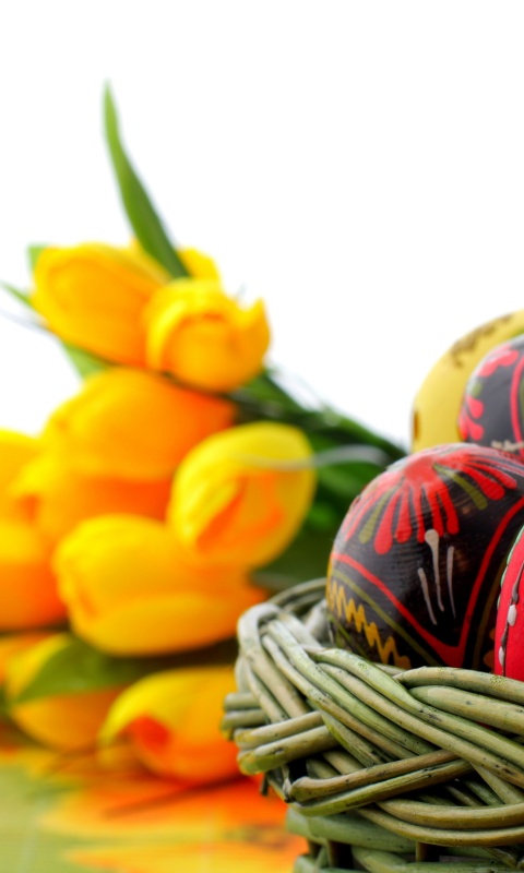 Easter Basket Of Eggs And Tulips