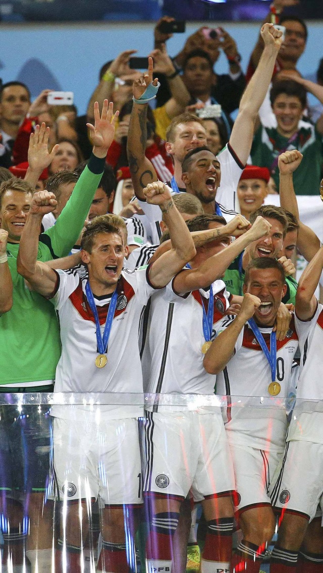 German Players Celebrate Title Of WC