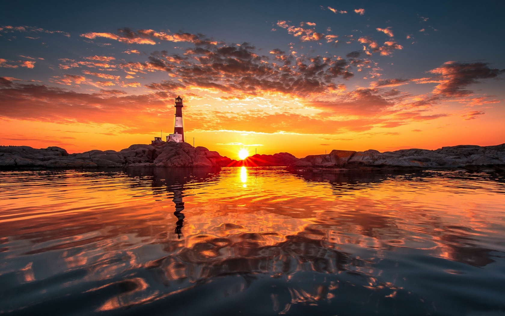 Lighthouse And Sunset