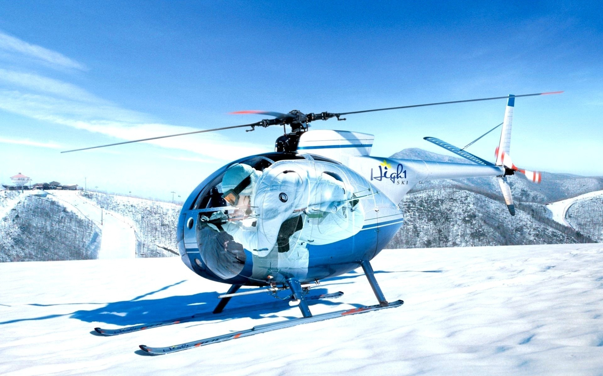 Mini Helicopters On The Snow Capped Mountain