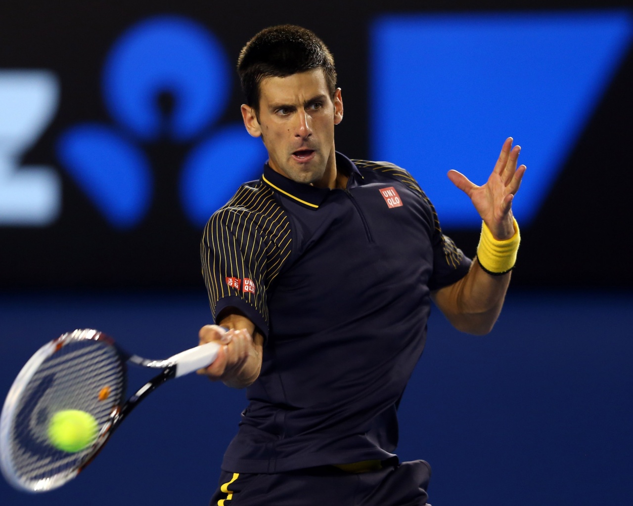 Novak Djokovic Hits The Tennis Ball
