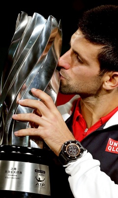 Novak Djokovic Kisses The Trophy