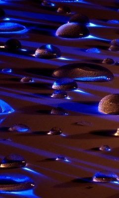 Water Drops In Blue Light