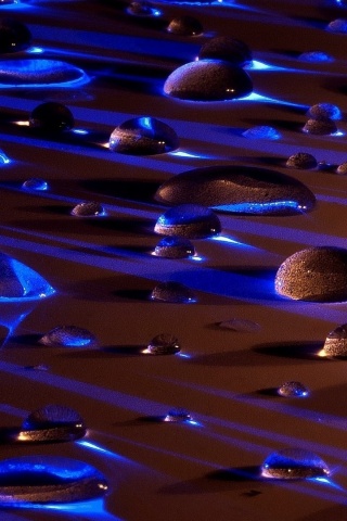 Water Drops In Blue Light