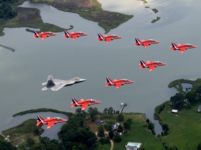 F22 And Red Arrows