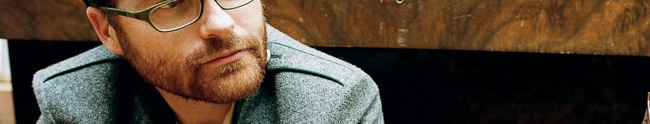 Colin Meloy Jacket Glasses Haircut Beard