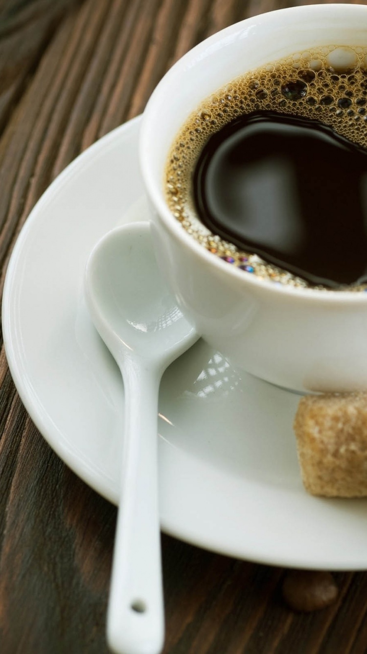 Cup Of Coffee And Sugar Cubes