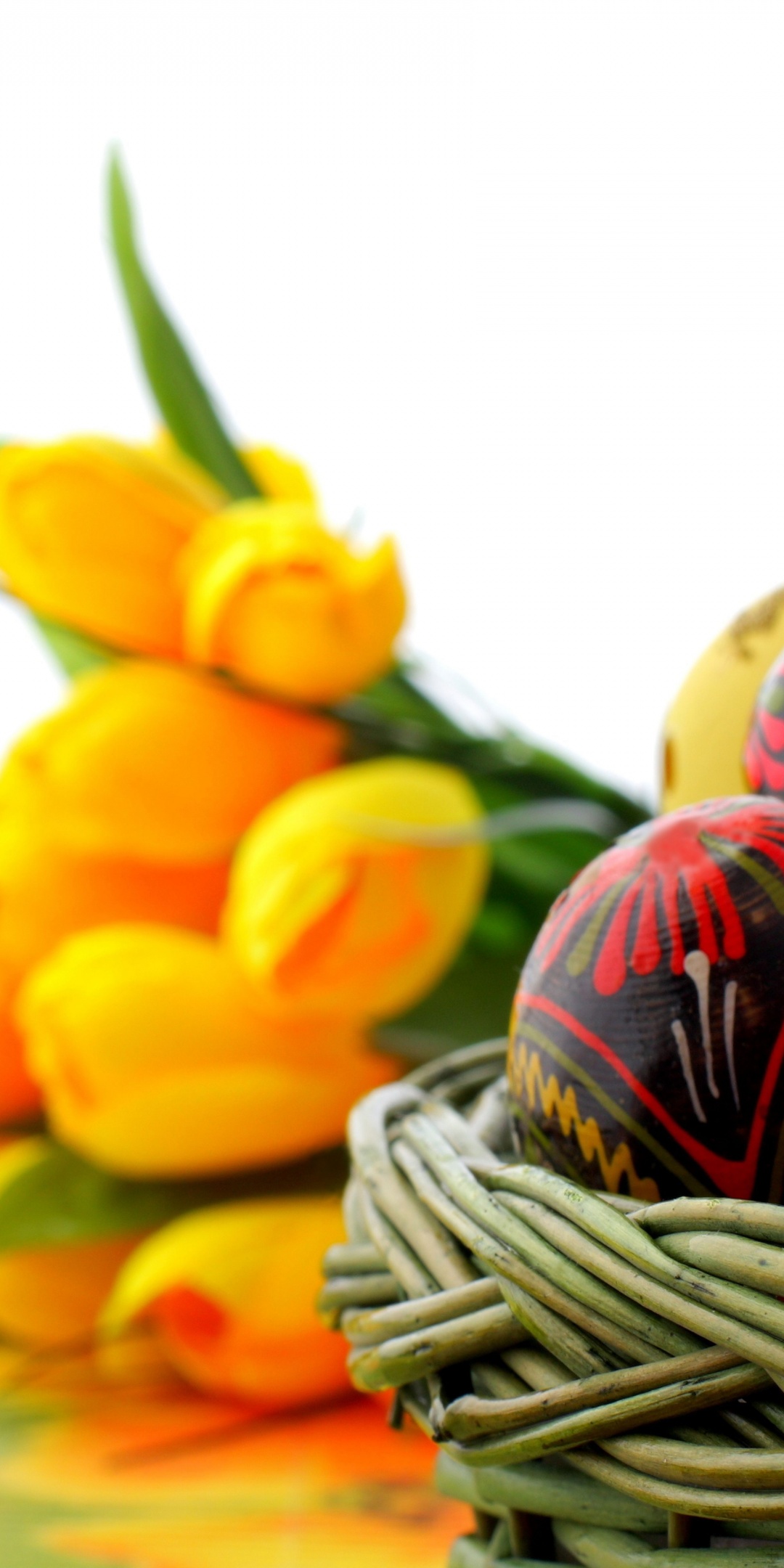 Easter Basket Of Eggs And Tulips