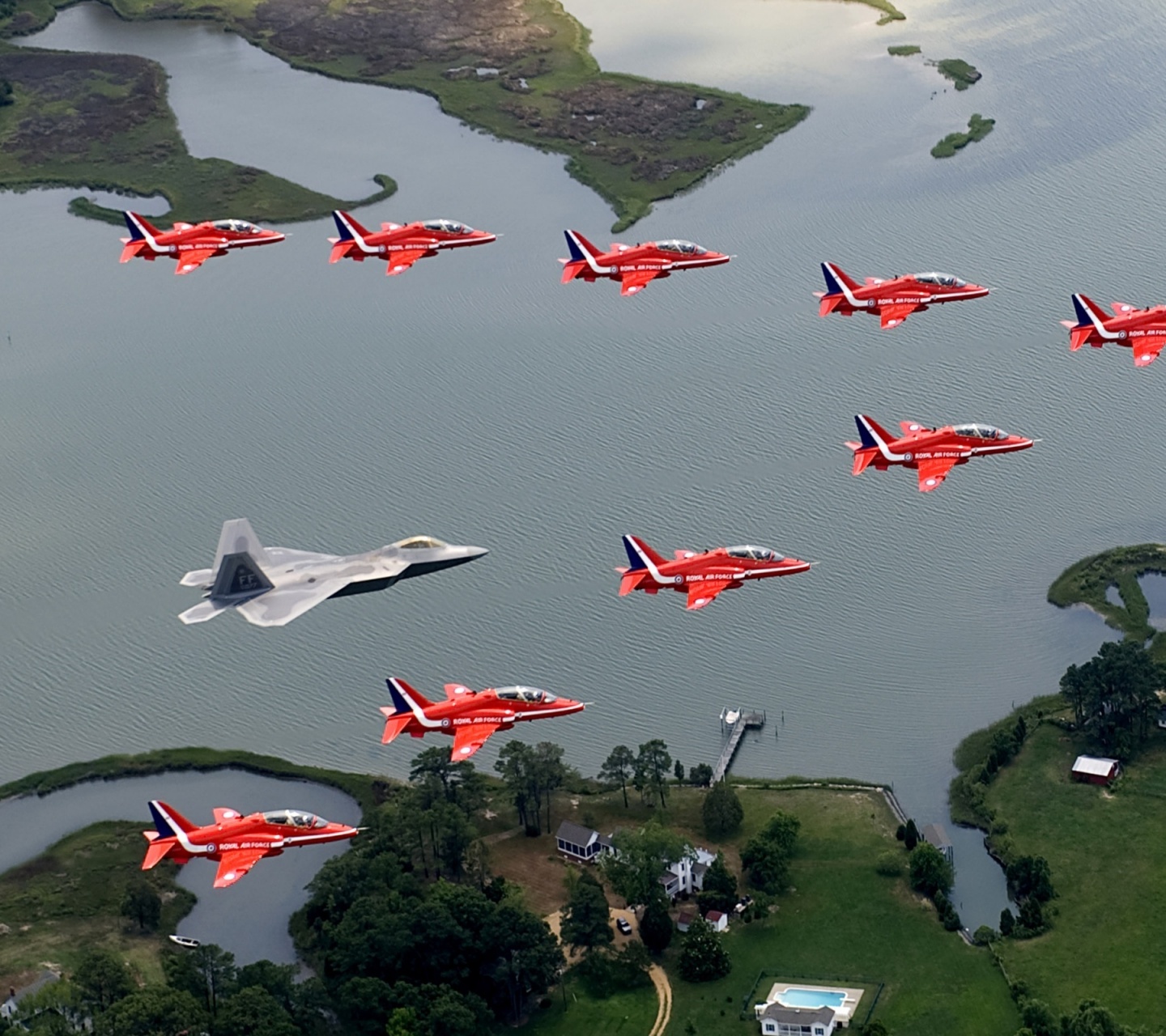 F22 And Red Arrows