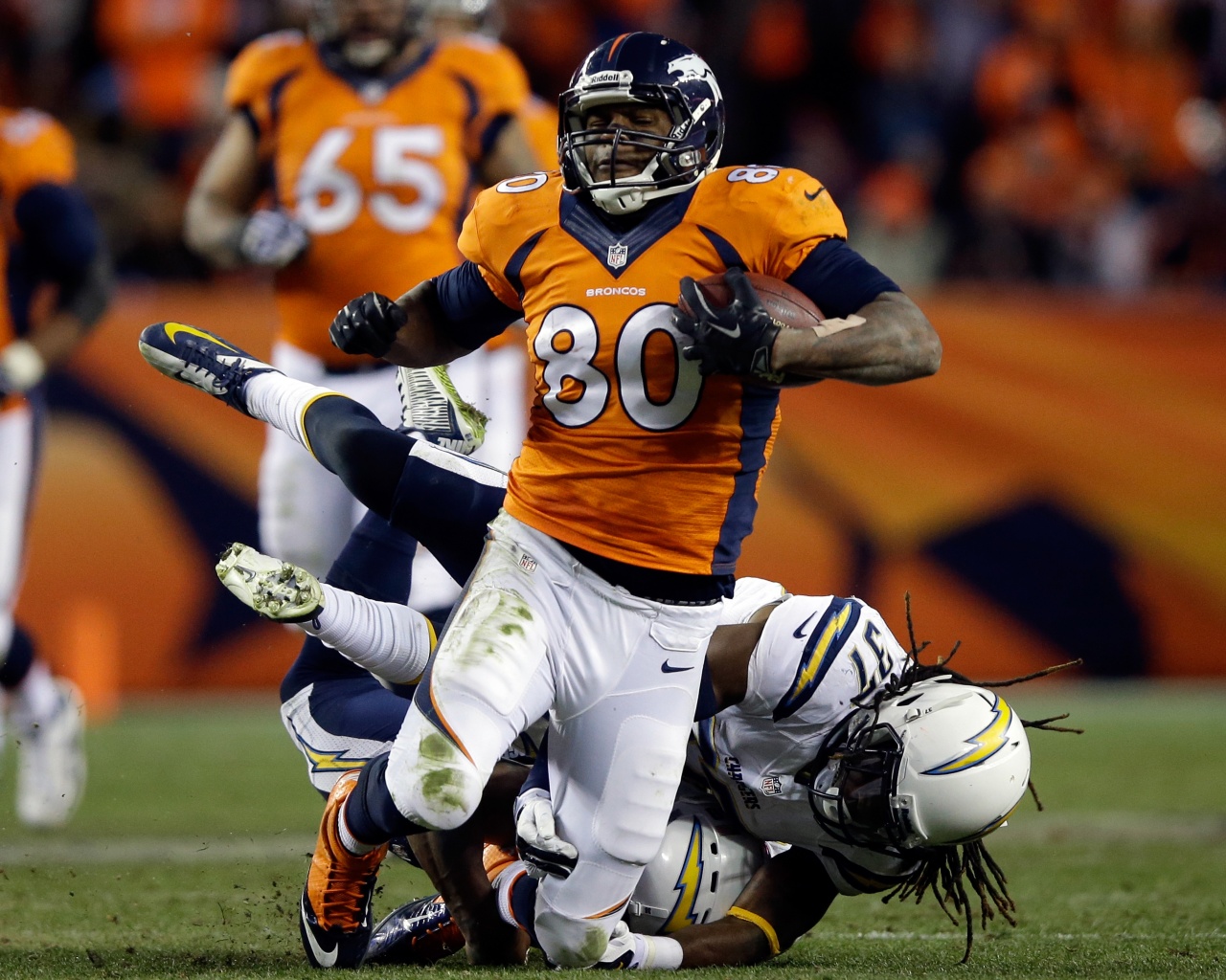 Julius Thomas Is Tackled By Addae