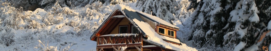 Mountain House Covered With Snow