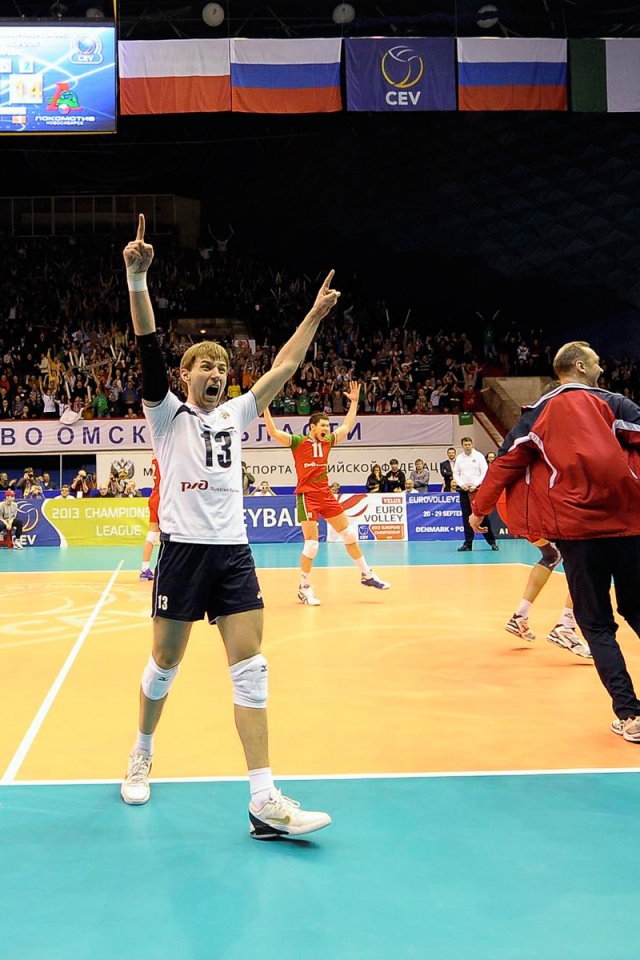 Volleyball Players Celebrate Victory